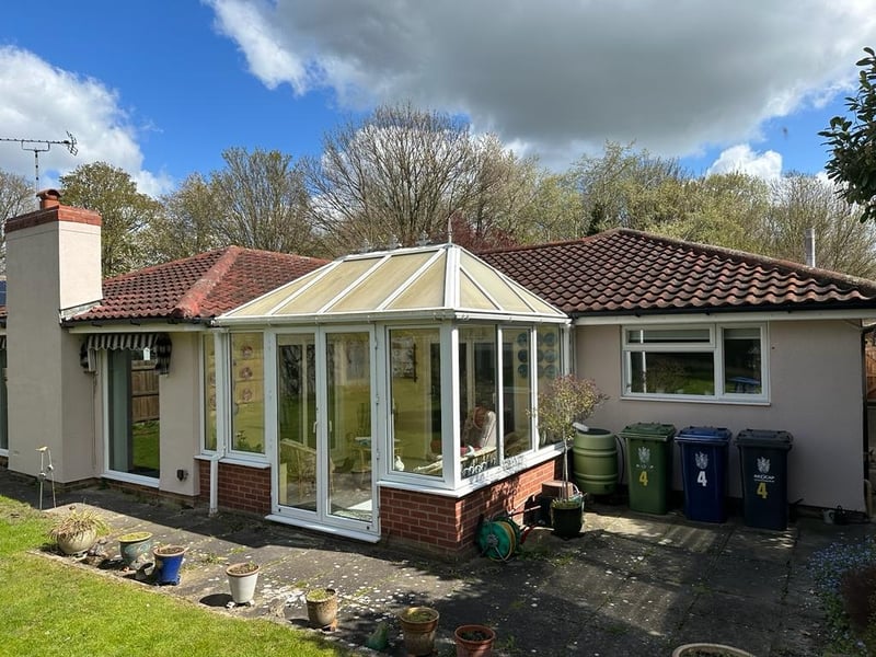 Original conservatory with a polycarbonate roof