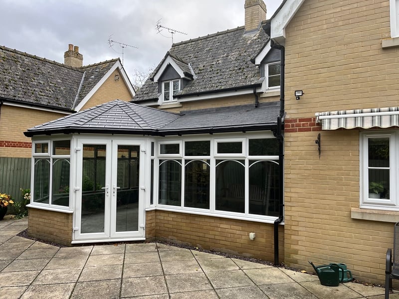 Mrs. Cole's Converted conservatory with a solid, insulated roof