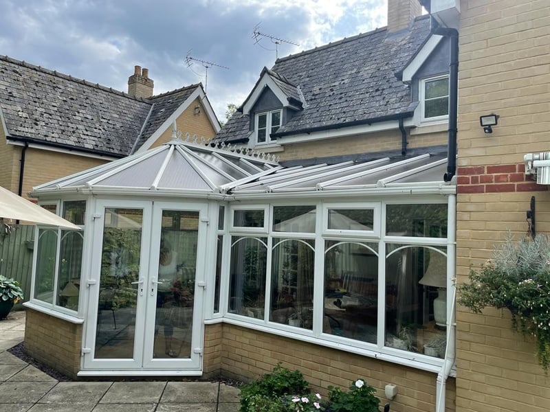 Mrs. Cole's initial conservatory with a polycarbonate roof