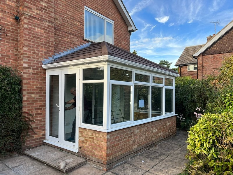 Converted Mayfield conservatory using a solid, insulated roof