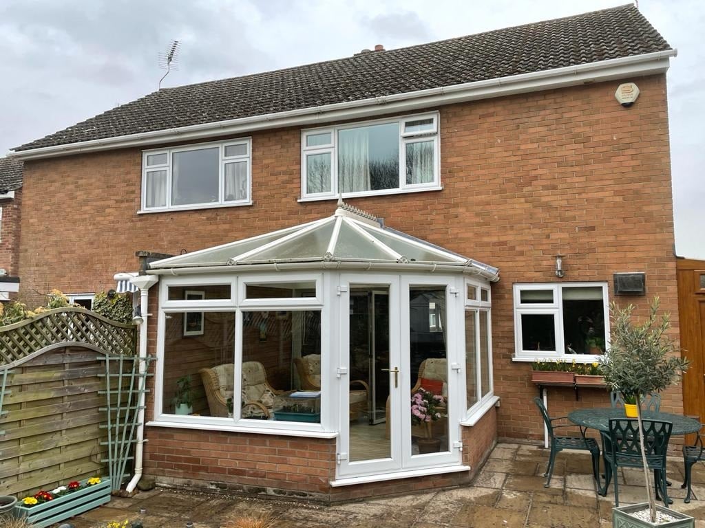 Conservatory in Cambridge before a Tiled Conservatory Roof Transformation