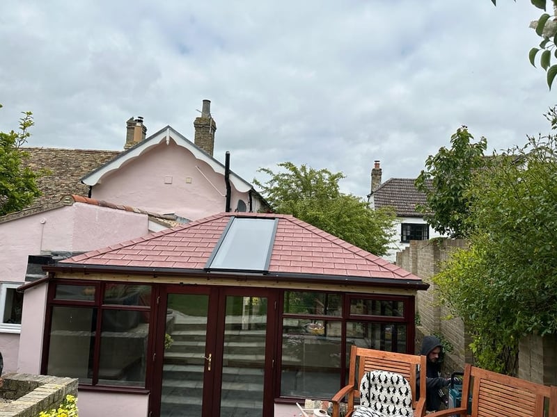 Transformed conservatory with an insulated, solid roof