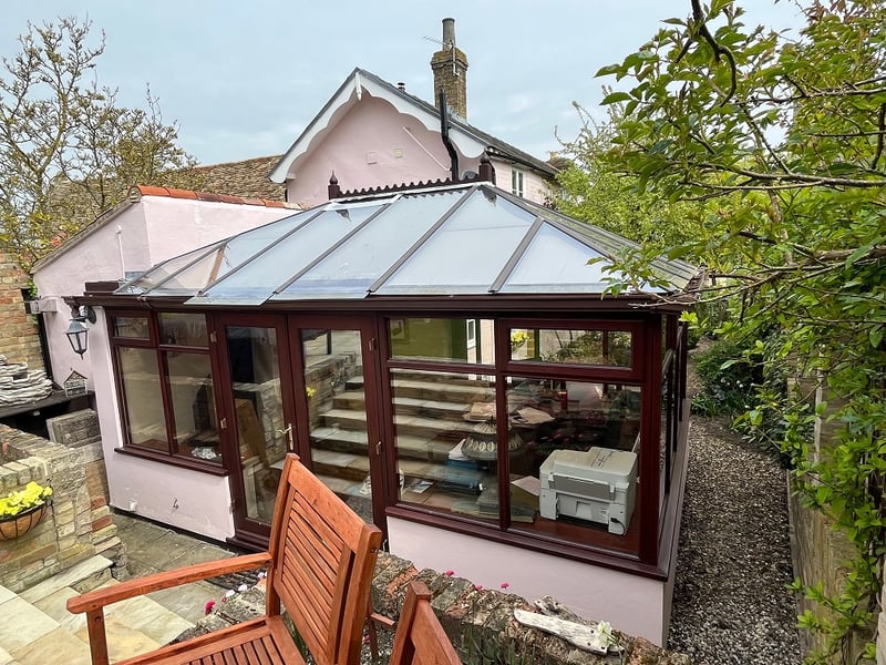 Original conservatory with a polycarbonate roof