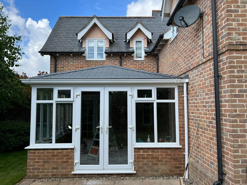 Beautiful tiled conservatory after its conservatory roof replacement