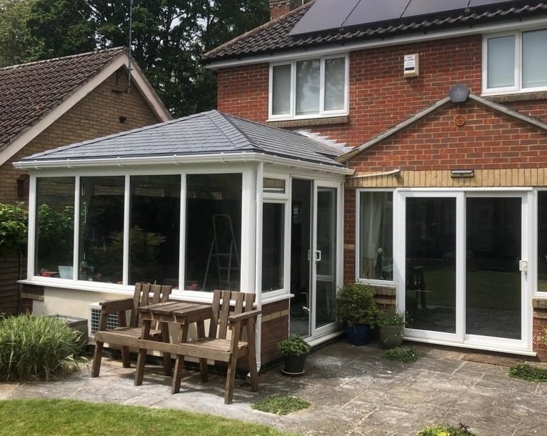 Transformed conservatory with a lovely, insulated, solid roof